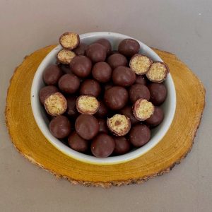 Quinua pop bañado en chocolate 55%